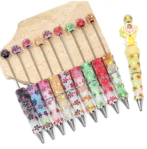 Handmade DIY gradient glass bubble bead beaded pen with cute flower decorations for gifts.