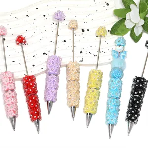 Colorful DIY beaded pens set featuring macaron colors and floral beads for creative writing