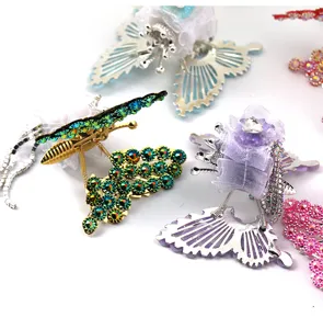 DIY rhinestone butterfly hair clip accessories metal and fabric fashion jewelry pieces.