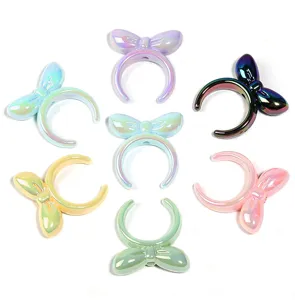 Perline distanziali a fiocco placcate UV colorate per accessori di gioielli DIY.