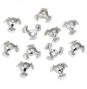 Silver metal bead caps detail shot, heart shaped jewelry spacer findings for DIY crafts.