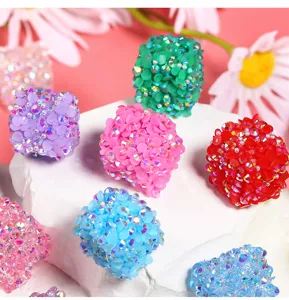 Colorful resin rhinestone square bead detail shot, sparkling DIY jewelry accessory close-up.