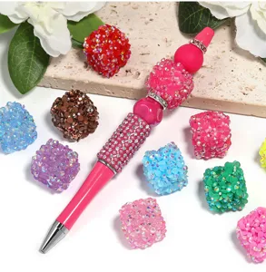 DIY beaded pen set with colorful square resin rhinestone sugar beads for creative crafting.