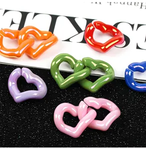 Glossy acrylic heart chain links, vibrant colorful DIY jewelry accessories and phone pendant details.