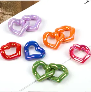 UV plated glossy acrylic heart chain links for DIY phone charms and jewelry accessories.