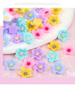 Colorful resin flowers, 3D double-color five-petal floral charms for nail art and DIY phone cases.