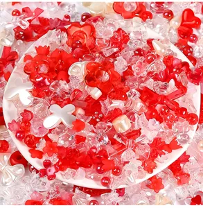 Mixed acrylic beads DIY material pack with assorted bows and hearts for phone chains and jewelry.