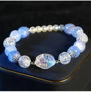 Exquisite blue crackle bead bracelet with iridescent shell pendant and pearls for women