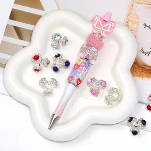 Set penna di perle fai-da-te con ciondolo farfalla rosa e distanziatori strass.