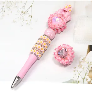 Stylo à bille perlé rose DIY avec strass en cristal de cœur et charms de fleurs pour cadeau
