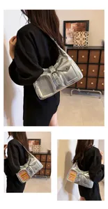 Silver metallic shoulder bag with transparent ita pocket, trendy crossbody tote for women.