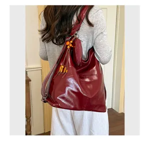 Red PU leather convertible backpack casual shoulder bag daily commuter bag detail view