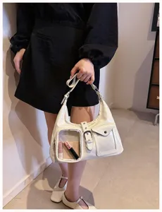 Trendy white glossy shoulder bag with clear front pocket, chic design multi-pocket messenger tote.