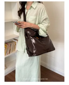 Stylish PU leather convertible backpack and crossbody bag for women, retro commuter tote.