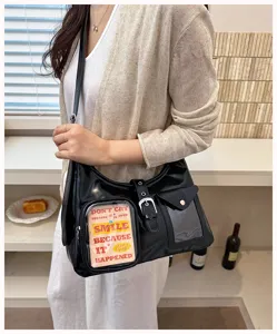 Black glossy PU leather shoulder bag with transparent pocket, stylish design for daily use.