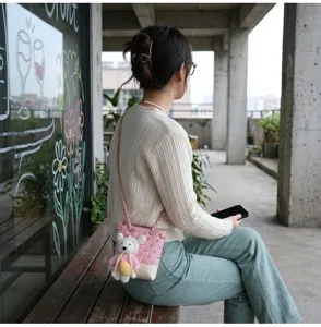 Chic Korean style quilted bucket bag with chain strap and cute bear pendant for women