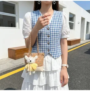 Korean style cute quilted diamond bucket crossbody bag with plush bear charm detail view