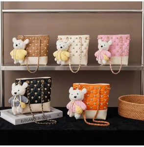 Chic Korean style bucket bag with cute bear pendant, stylish rhinestones and quilted design.