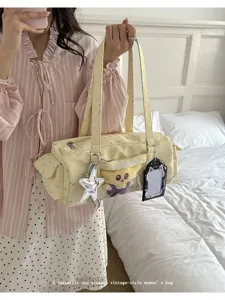 Japanese style cute anime ita shoulder tote bag with transparent window plush pendant.