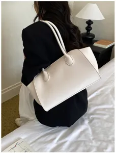White leather shoulder tote bag, stylish minimalist daily underarm bag for women commuters.