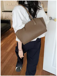 Stylish brown leather tote bag for women, large capacity single shoulder commute handbag chic.