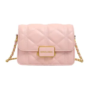 Pink quilted chain shoulder bag for women, luxury style small square crossbody bag daily use.
