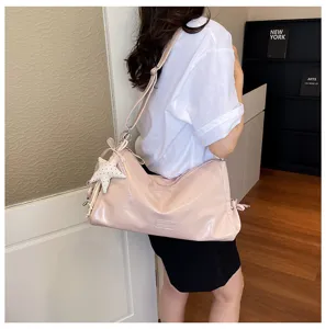 Retro trend women large capacity shoulder crossbody bag, stylish commuter tote bag detail view.