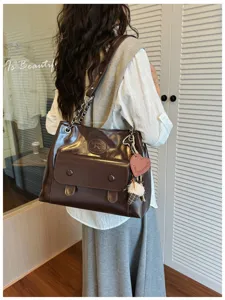Vintage brown large capacity shoulder bag for women, stylish tote bag with chain strap.