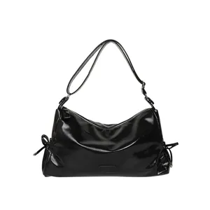 Black patent leather shoulder bag stylish commuter tote bag with zipper and bows
