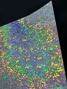 Detail view of holographic glitter cardstock, shimmering double-flash backing paper.