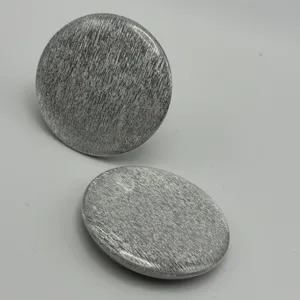 Round metal badge pin blank with brushed silver texture, perfect for anime merch and DIY crafts.