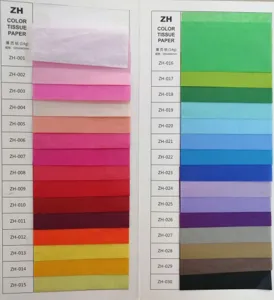 Detailed view of color tissue paper swatch card showing various vibrant color options available.