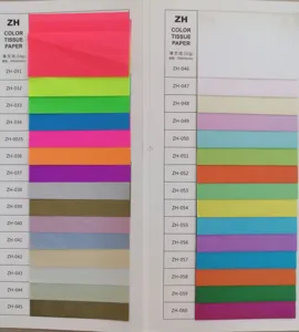 Colorful tissue paper color card catalog display with multiple shades and specifications.