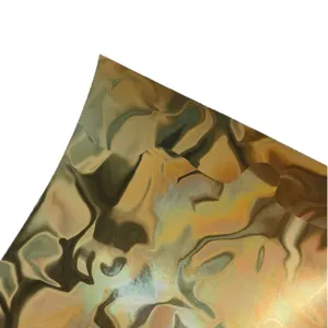 Gold metallic water ripple special paper for handmade craft badge backing and decorative use.
