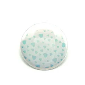 Holographic maze pattern blue hearts badge pin anime peripheral merchandise detail.