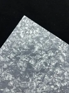 Detailed close-up of glossy porcelain specialty paper with double-flash texture for crafts.