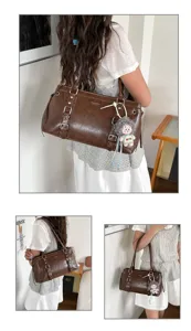 Retro schoudertas met grote capaciteit voor dames, stijlvolle PU lederen tas met gesp.