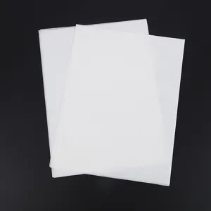 Detailed view of white translucent tissue wrapping paper for delicate items and floral packaging.