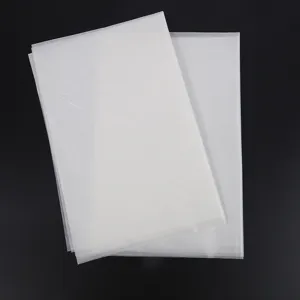 Detail view of translucent white tissue paper, lightweight packaging and wrapping fill.