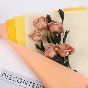 Detailed view of colorful tissue paper wrapping for flowers and gift boxes, lightweight 14gsm.