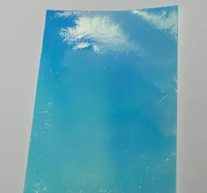 Blue holographic backing paper sheet for DIY badge packaging and decoration supplies.
