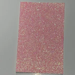 Pink glitter cardstock paper for badge backing and DIY crafts, iridescent sparkle detail.