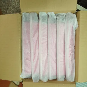 Detailed view of white protective wrapping tissue paper neatly packed in a sturdy carton box.