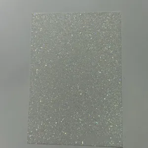 Silver glitter backing paper for DIY badges and crafts, fine sparkle decorative sheet detail.
