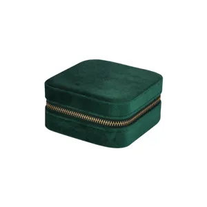 Dark green velvet portable jewelry box with zipper for rings, necklaces, and earrings.