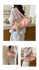 Stylish pink pleated shoulder bag for women, large capacity vintage commuter tote bag with cute pendant.