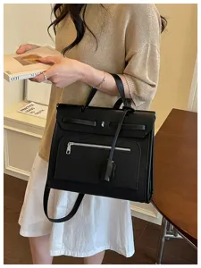 Sac a main noir elegant style Kelly, grande capacite sac porte epaule et bandouliere chic.