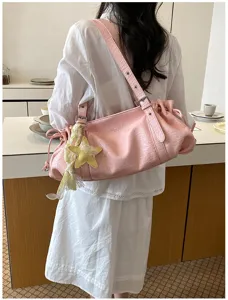 Pink pleated shoulder bag with star charm, vintage underarm tote for women commuter summer style.