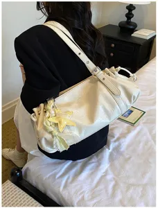 Elegant white pleated shoulder bag with cute star charm, vintage commuter underarm tote.