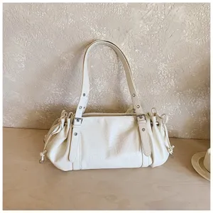 White pleated women shoulder bag, vintage underarm tote with buckle straps and side drawcords.